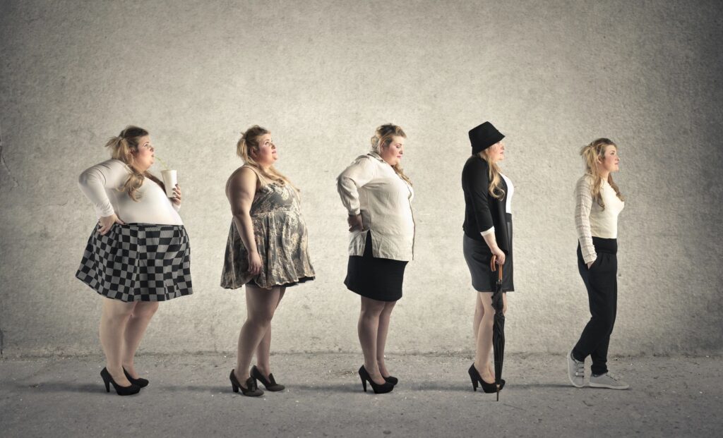 Conceptual image showing a woman at five different stages of weight loss, progressing from left to right. The woman starts heavier, holding a drink and wearing a checkered skirt, and gradually appears slimmer and more confident, ending in athletic wear with a relaxed posture against a neutral textured background.